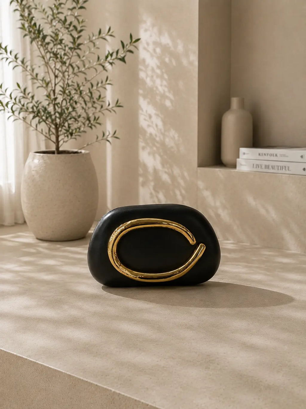 Celia Gold Clutch Bag
