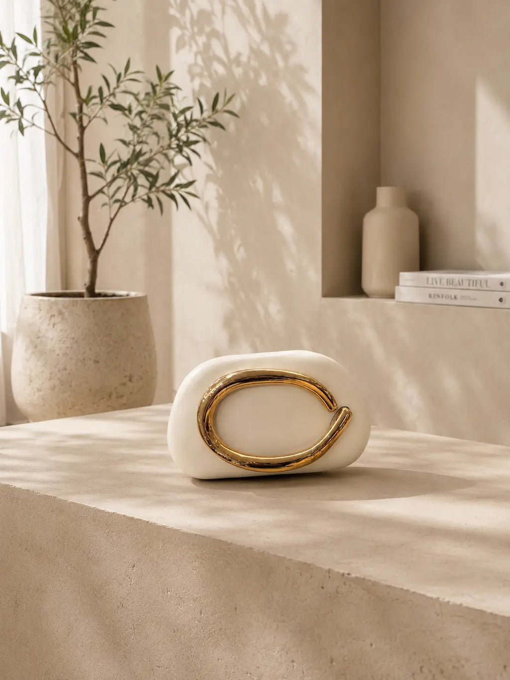 Celia Gold Clutch Bag
