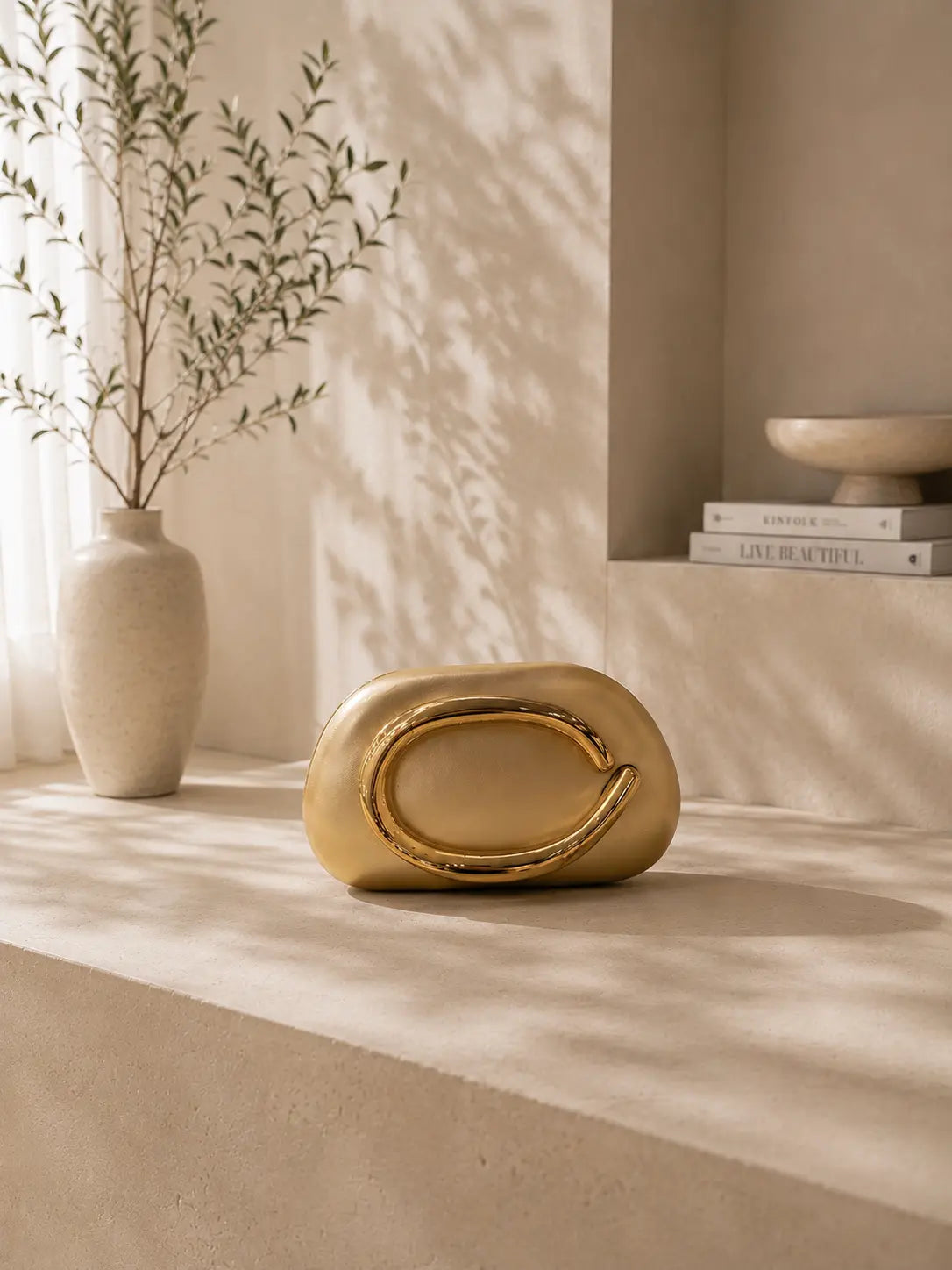 Celia Gold Clutch Bag