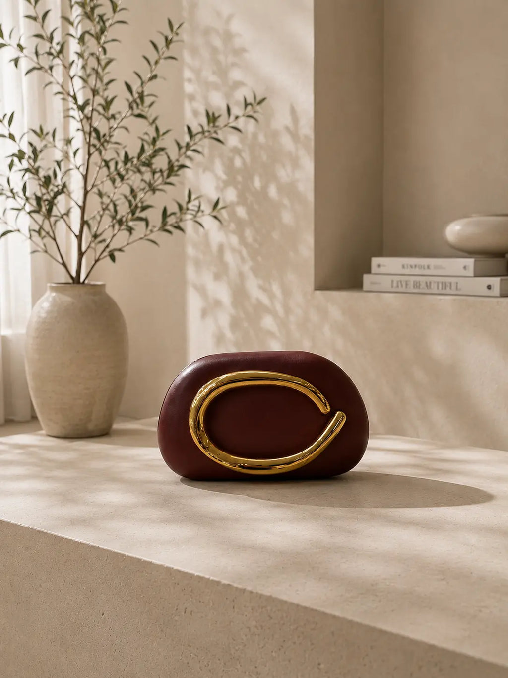 Celia Gold Clutch Bag
