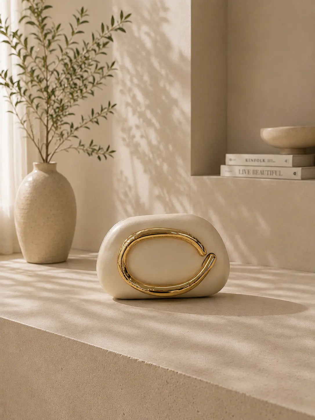 Celia Gold Clutch Bag